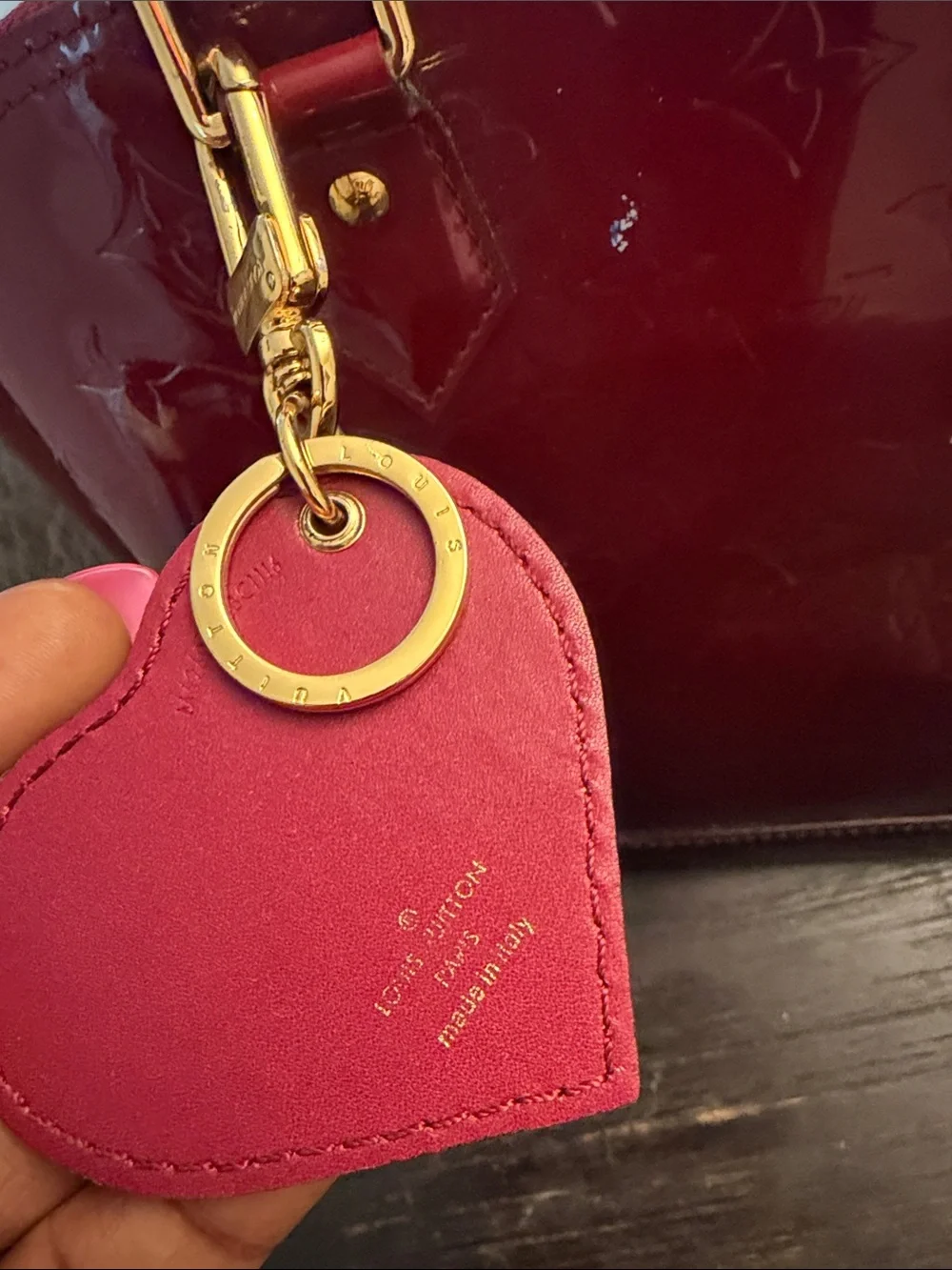 Louis Vuitton Burgundy Leather purse with Gold Hardware